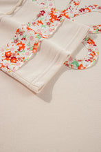 Load image into Gallery viewer, Exposed Seam Slit Floral Round Neck Blouse