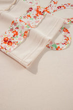 Load image into Gallery viewer, Exposed Seam Slit Floral Round Neck Blouse

