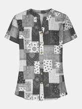 Load image into Gallery viewer, Printed Notched Short Sleeve Blouse
