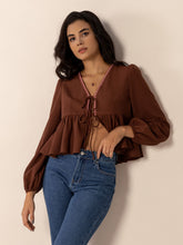 Load image into Gallery viewer, Peplum Tied V-Neck Long Sleeve Blouse

