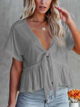 Load image into Gallery viewer, Tied Plunge Short Sleeve Blouse
