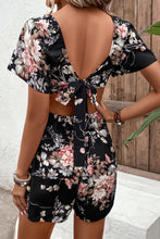 Load image into Gallery viewer, Floral Cutout Tie Back Romper
